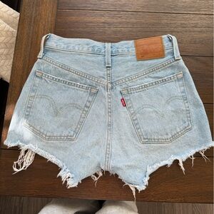 Levi’s light blue denim distressed shorts